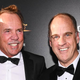 Mitch Lowe and Ted Farnsworth smiling and looking at the camera during a movie premier for the film Gotti